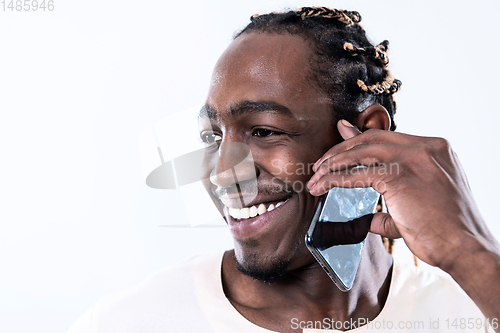 Image of african man using smartphone