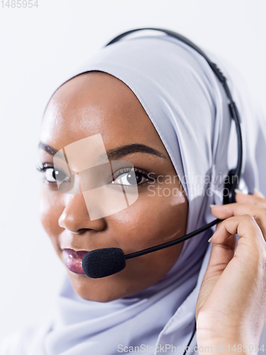 Image of african customer representative business woman with phone headse