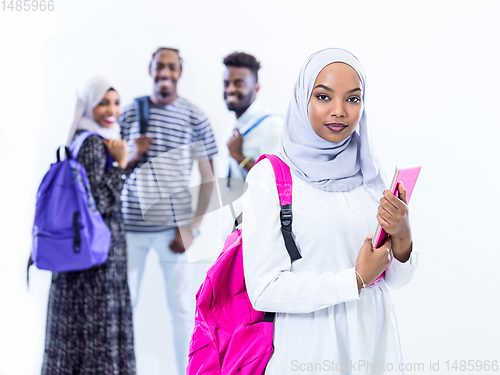 Image of portrait of african female student with group of friends