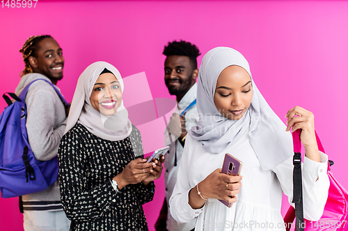 Image of african students group using smart phones