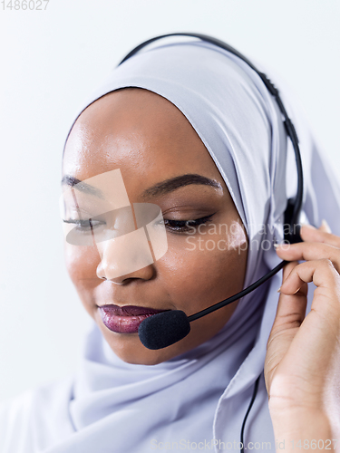 Image of african customer representative business woman with phone headse