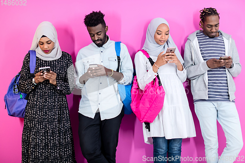 Image of african students group using smart phones