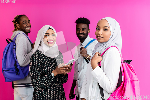 Image of african students group using smart phones