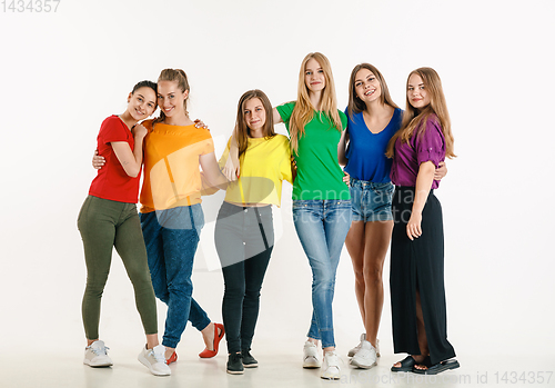 Image of Young people weared in LGBT flag colors isolated on white background, LGBT pride concept