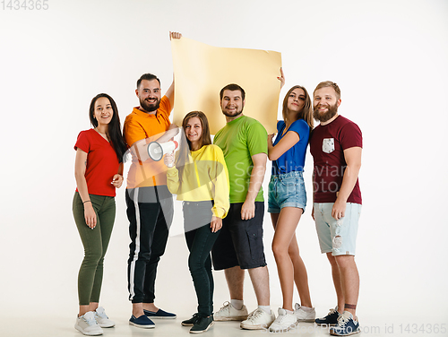 Image of Young people weared in LGBT flag colors isolated on white background, LGBT pride concept