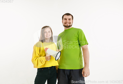 Image of Young men weared in LGBT flag colors isolated on white background, LGBT pride concept