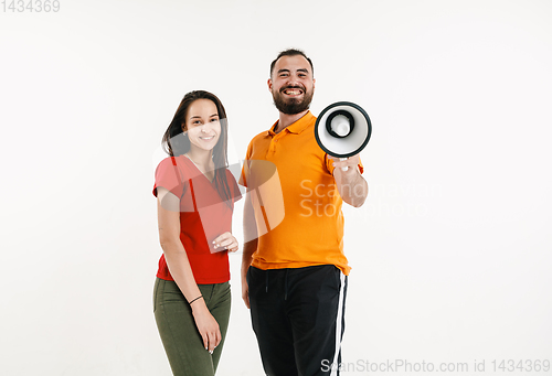 Image of Young men weared in LGBT flag colors isolated on white background, LGBT pride concept