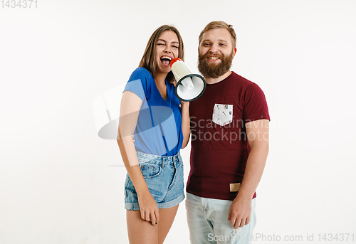 Image of Young men weared in LGBT flag colors isolated on white background, LGBT pride concept