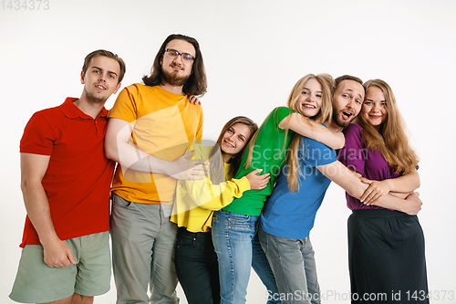 Image of Young people weared in LGBT flag colors isolated on white background, LGBT pride concept