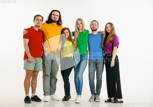 Image of Young people weared in LGBT flag colors isolated on white background, LGBT pride concept