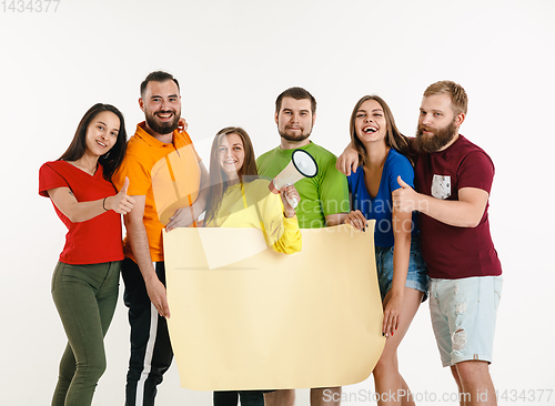 Image of Young people weared in LGBT flag colors isolated on white background, LGBT pride concept