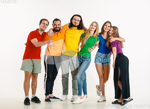 Image of Young people weared in LGBT flag colors isolated on white background, LGBT pride concept