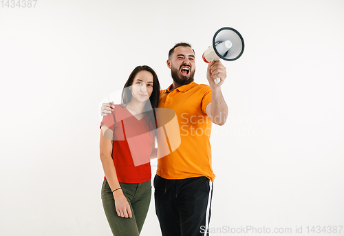 Image of Young men weared in LGBT flag colors isolated on white background, LGBT pride concept