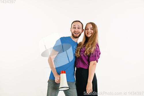 Image of Young men weared in LGBT flag colors isolated on white background, LGBT pride concept