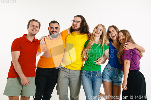 Image of Young people weared in LGBT flag colors isolated on white background, LGBT pride concept