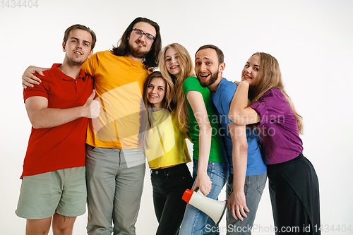 Image of Young people weared in LGBT flag colors isolated on white background, LGBT pride concept