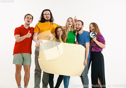 Image of Young people weared in LGBT flag colors isolated on white background, LGBT pride concept