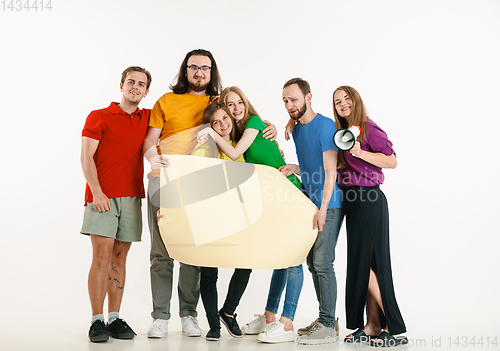 Image of Young people weared in LGBT flag colors isolated on white background, LGBT pride concept