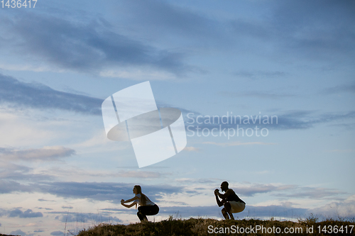 Image of Young multiethnic international couple outdoors