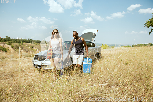 Image of Young multiethnic international couple outdoors