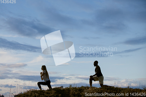 Image of Young multiethnic international couple outdoors