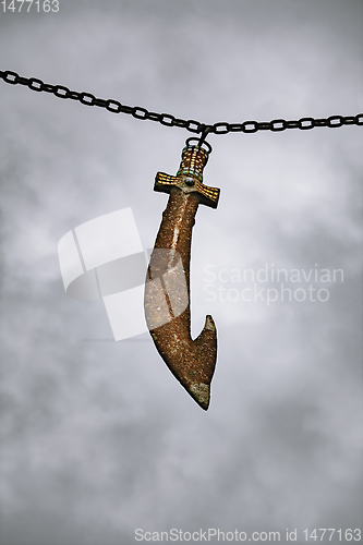 Image of Sword hanging on a chain