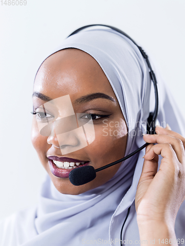 Image of african customer representative business woman with phone headse