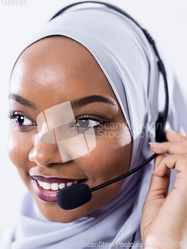 Image of african customer representative business woman with phone headse