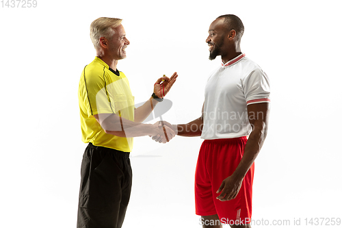 Image of Football referee gives directions with gestures to players isolated on white background