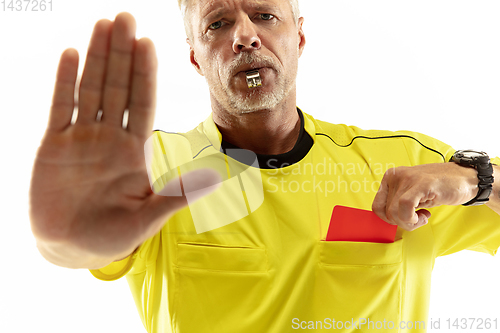 Image of Football referee showing a red card to a displeased player isolated on white background