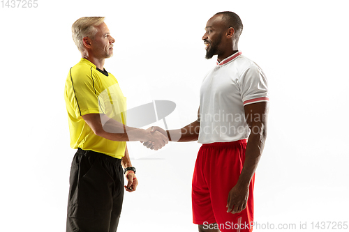 Image of Football referee gives directions with gestures to players isolated on white background