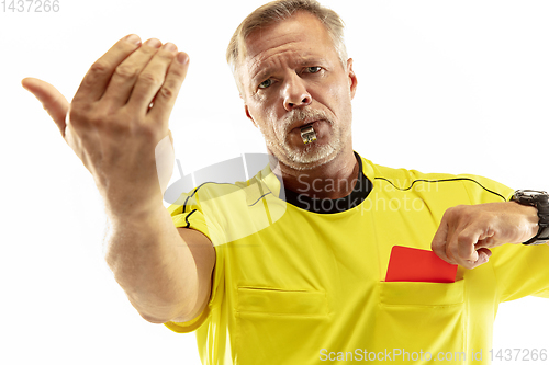 Image of Football referee showing a red card to a displeased player isolated on white background