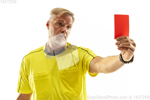 Image of Football referee showing a red card to a displeased player isolated on white background