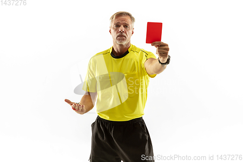 Image of Football referee showing a red card to a displeased player isolated on white background