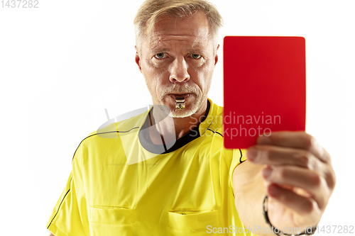 Image of Football referee showing a red card to a displeased player isolated on white background