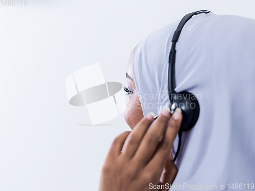 Image of african customer representative business woman with phone headse