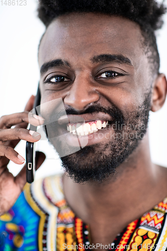 Image of african man on phone