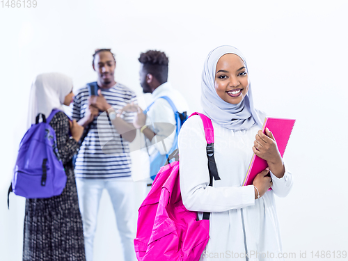 Image of portrait of african female student with group of friends