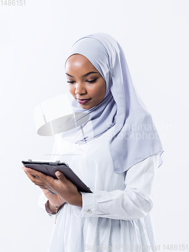 Image of african business woman using tablet computer