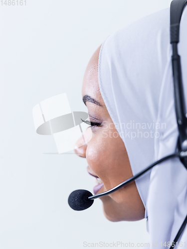 Image of african customer representative business woman with phone headse