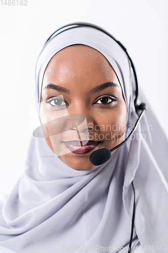 Image of african customer representative business woman with phone headse