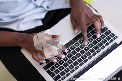 Image of African student using laptop computer