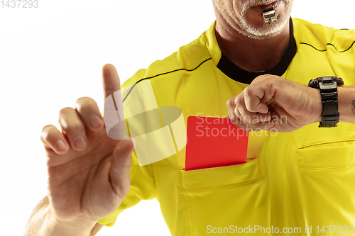 Image of Football referee showing a red card to a displeased player isolated on white background