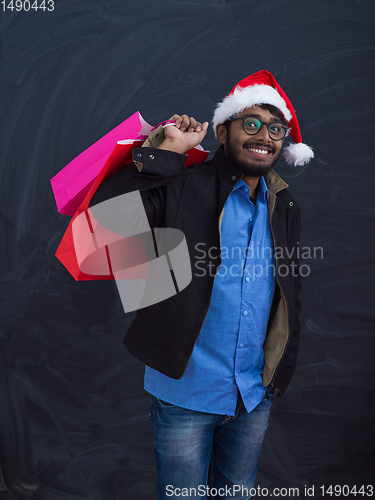 Image of Indian Santa with shopping bags