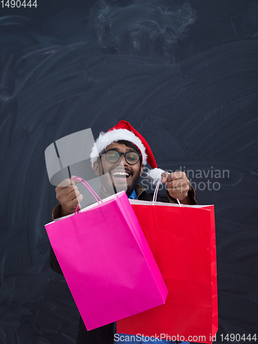 Image of Indian Santa with shopping bags