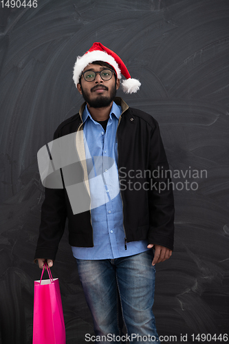 Image of Indian Santa with shopping bags