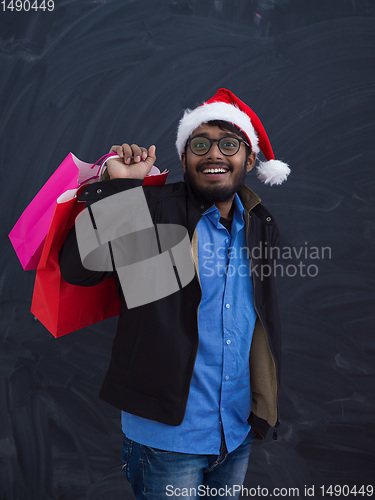 Image of Indian Santa with shopping bags