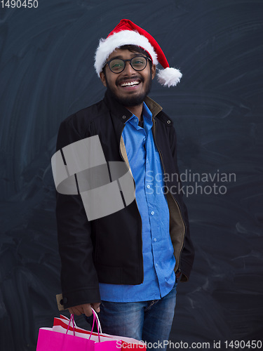 Image of Indian Santa with shopping bags