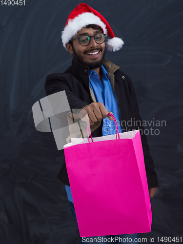 Image of Indian Santa with shopping bags