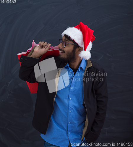 Image of Indian Santa with shopping bags